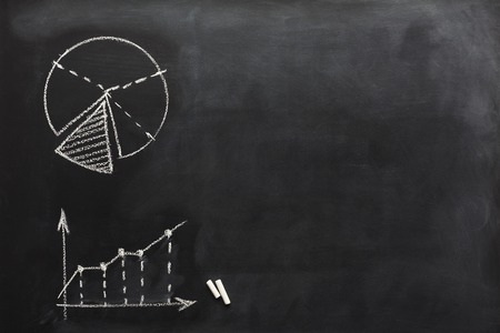 Conceptual educational or business diagrams background. schematic results and growth graphs and charts and drawn with chalk on blackboard with copy spaceの写真素材