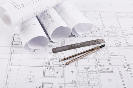 Workplace of architect. Engineering tools for creating new architectural project on table.の写真素材