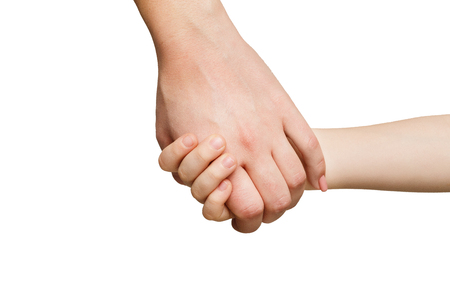 Mother holding hand of her child, isolated on white background. Love, family, togetherness conceptの写真素材