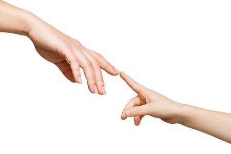 Mother and child touching fingers, isolated on white background. Love, trust, family conceptの写真素材