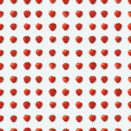 Seamless pattern with strawberries. Red berries isolated on white, top view. Juicy food backgroundの写真素材