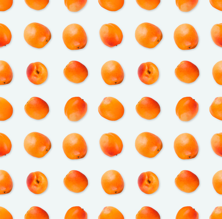 Seamless pattern with apricots. Berries isolated on white, top view. Juicy food backgroundの写真素材
