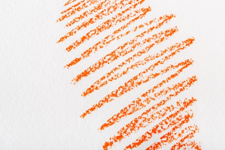 Wax crayon abstract painted background. Red drawing on white textured paperの写真素材