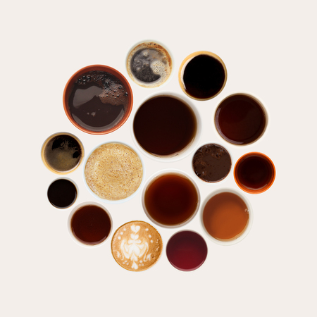 Set of coffee foams isolated on white background. Above view on different cups.の写真素材