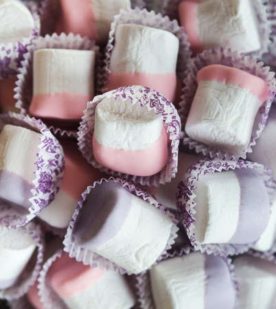 Colorful marshmallows platter for party dessert stand. Candy bar and catering concept for birthday, wedding and other holiday celebration, closeupの写真素材