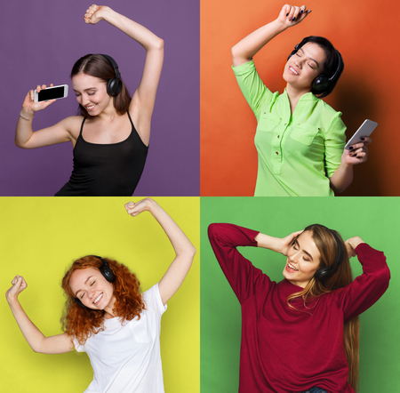 Collage of different women enjoying music online in earphones, dancing with closed eyes, on colorful studio backgroundsの写真素材