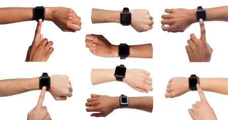 Set of diverse hands using and pointing on smart watch, isolated on white background, copy spaceの写真素材