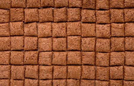Breakfast cereal pillows in raws like bar of chocolate, top view