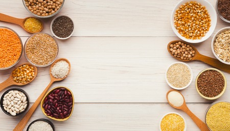 Healthy eating. Groceries assortment on white wooden background, copy spaceの写真素材