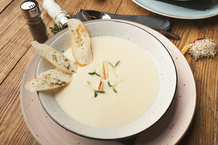 Delicious homemade cheese soup with croutons, restaurant serving, closeupの写真素材