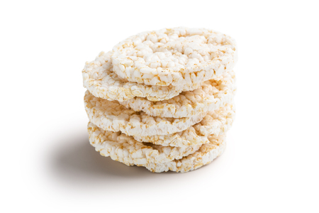 Stack of rice diet bread isolated on white background, top view.の写真素材