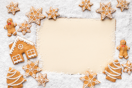 Christmas frame with copy space for greetings decorated with gingerbread cookies, top viewの写真素材