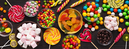 Assorted colorful candies background, top view, copy spaceの写真素材