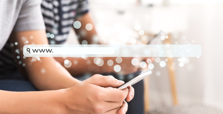 Guy browsing on smartphone with virtual blank search bar