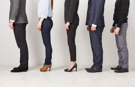 Unrecognizable business people profile in office. Professional team posing for photo, subordination concept, cropの写真素材
