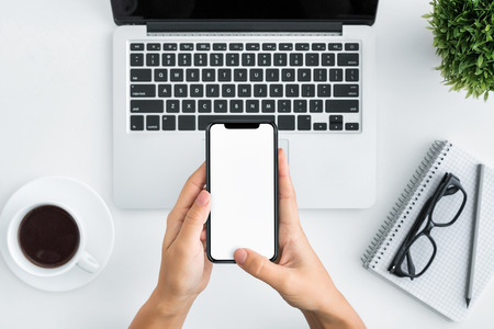 SMM, Social media marketing concept. Hands using smartphone with blank screen, copy space