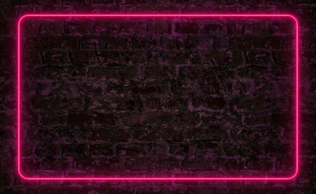 Pink neon frame on dark brick wall with copy spaceの写真素材