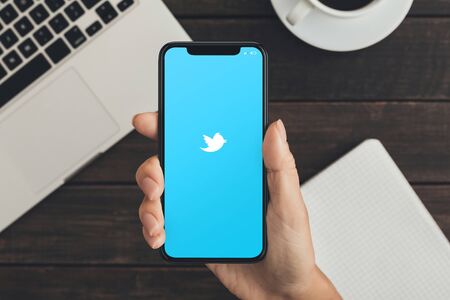 KHARKOV, UKRAINE - December 23,2018: Iphone X open Twitter app. Online social networking and microblogging serviceのeditorial素材