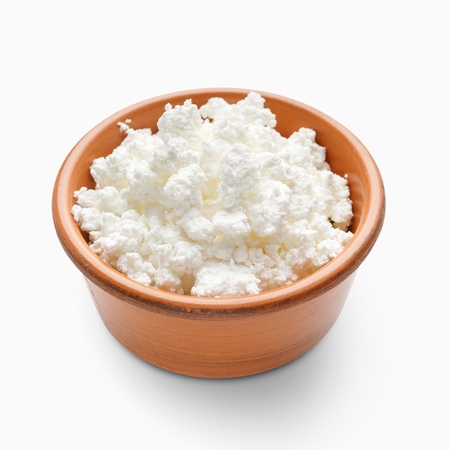 Bowl of cottage cheese on white background. Eco farm products conceptの写真素材