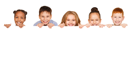 Children with empty board for your text isolated on white backgroundの写真素材