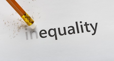 Equality concept. Erase part In in word Inequality with pencil eraser on white background, panoramaの素材 [FY310117212769]