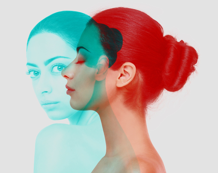 Double color exposure effect of beautiful woman, profile and closeup portraitの写真素材