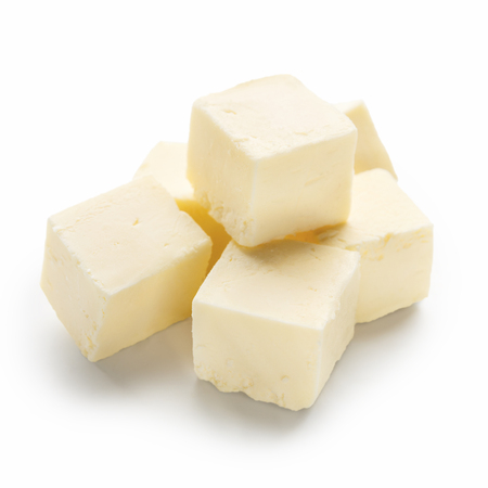 Cubes of butter on white backgroundの写真素材