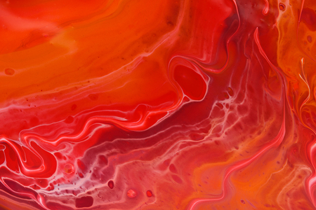 Abstract stains background, living coral, red color paintsの写真素材