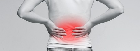 Kidneys pain, urolithiasis disease. Female body with inflamed loin, panoramaの写真素材