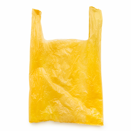 Empty yellow plastic bag isolated on white background, copy spaceの写真素材