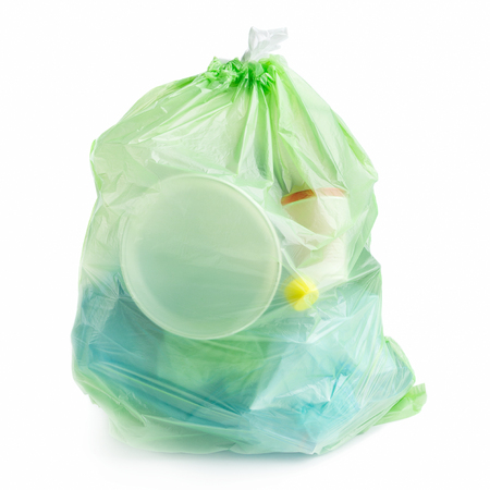 Plastic garbage bag full of plastic trash on white background, isolatedの写真素材