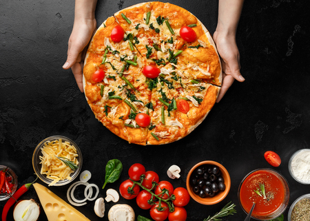 Hot Pizza With Asparagus And Cherry Tomatoes, Ingredients Nearby On Dark Table, Top Viewの写真素材