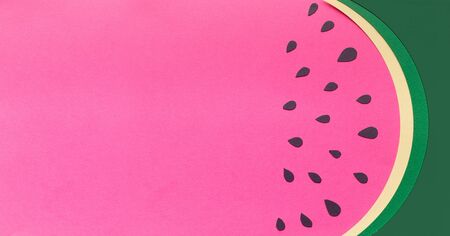 Creative summer background of watermelon slice with copy space, panorama, paper compositionの写真素材