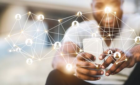 Global Connection Internet Concept. Man using cellphone with digital network virtual iconの写真素材