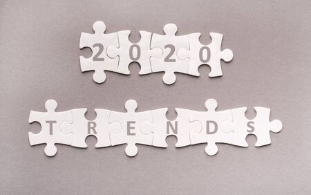 Pazzle it. Creative 2020 trends concept on grey background, panorama, copy space