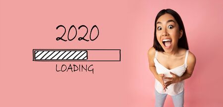 2020 loading concept, emotional asian girl shouting on pink background