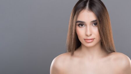 Beauty and body care. Young beautiful woman fashion portrait, empty spaceの写真素材