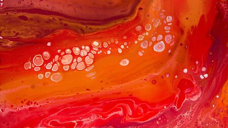 White dots, stains and curles on coral red, abstract background, panoramaの写真素材