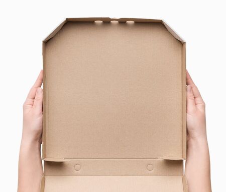 Pizza delivery. Courier holding empty cardboard box, top view, white background