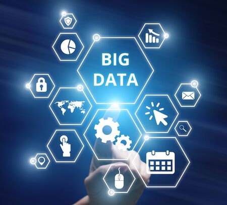 Man hand selecting and pressing settings symbol for big data conceptの写真素材