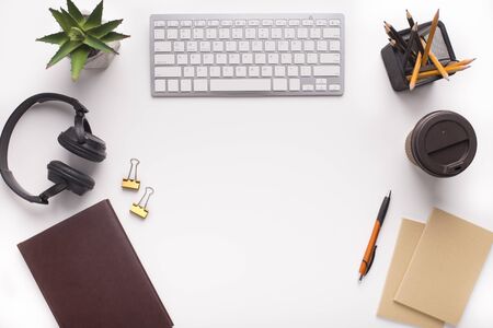 Modern Workplace with office stationery on white