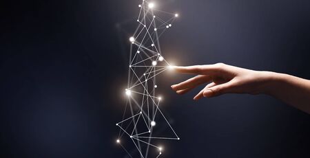 Creating innovative technology. Woman finger touching 3D network with points on blue background,...