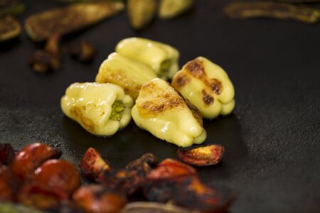 Fresh and healthy. Grilled peppers and vegetables for sale outdoorの写真素材