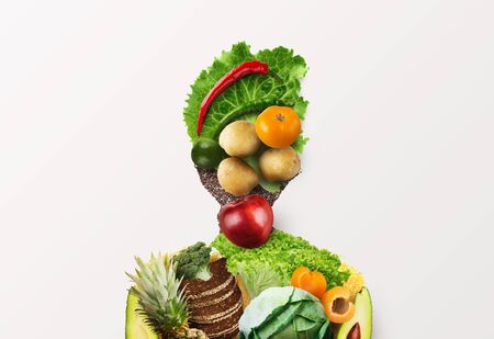 Choose healthy food for your organism. Woman of fresh vegetables, fruits and whole grain products on white backgroundの写真素材