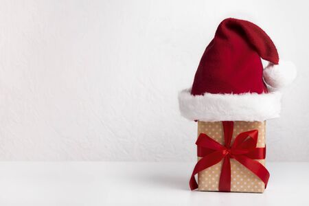 Santa's present in box with big red ribbon bow on white background, copy spaceの写真素材