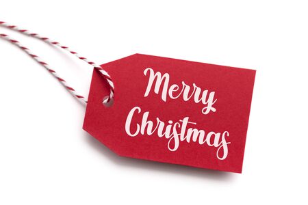 Merry Christmas text handwriting on red label, white backgroundの写真素材