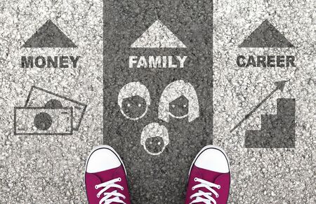 Work-Life Balance Between Money, Family And Career. Equal time for personal and professional life.の写真素材