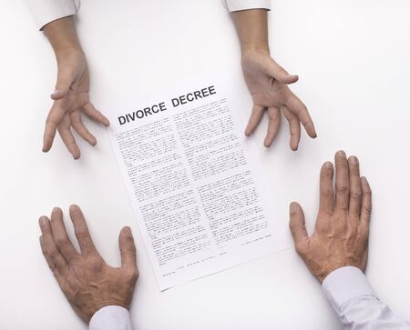 Wife arguing with husband about terms of divorce agreement, family dissolution, disagreement,...