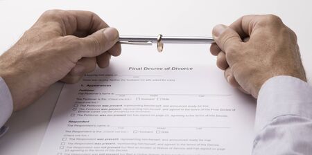 Husband writing divorce papers or premarital agreement prepared by lawyer, panorama