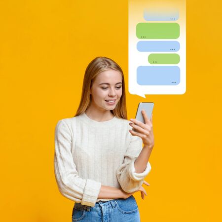 Chat service. Blonde girl using social media messenger on orange background, blank space